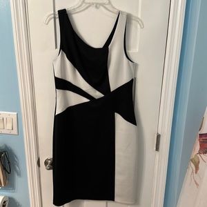 Deessbarn. Cream and black design. No label. Size 12